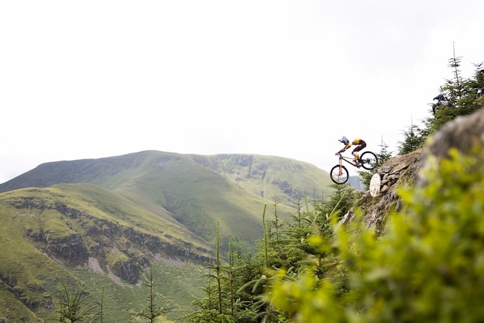 Downhill mountain bike rider in action in the great outdoors