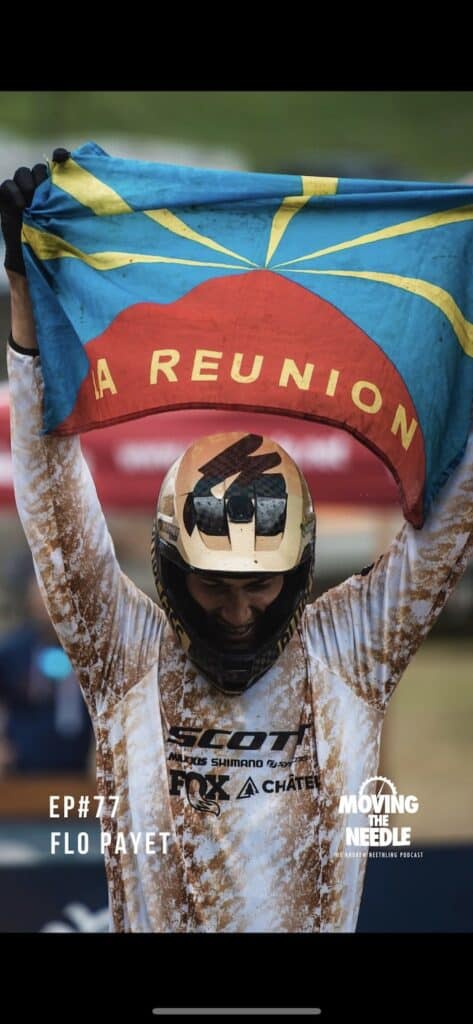 Mountain biker waving the Réunion flag