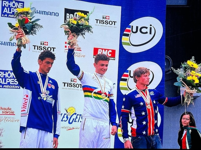 Professional mountain biker on the podium after a competition
