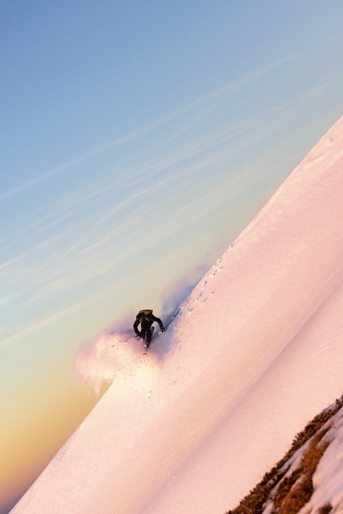 Photo of a skier in powder snow off-piste