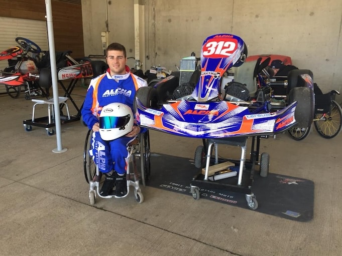 Disabled athlete in front of his go-kart